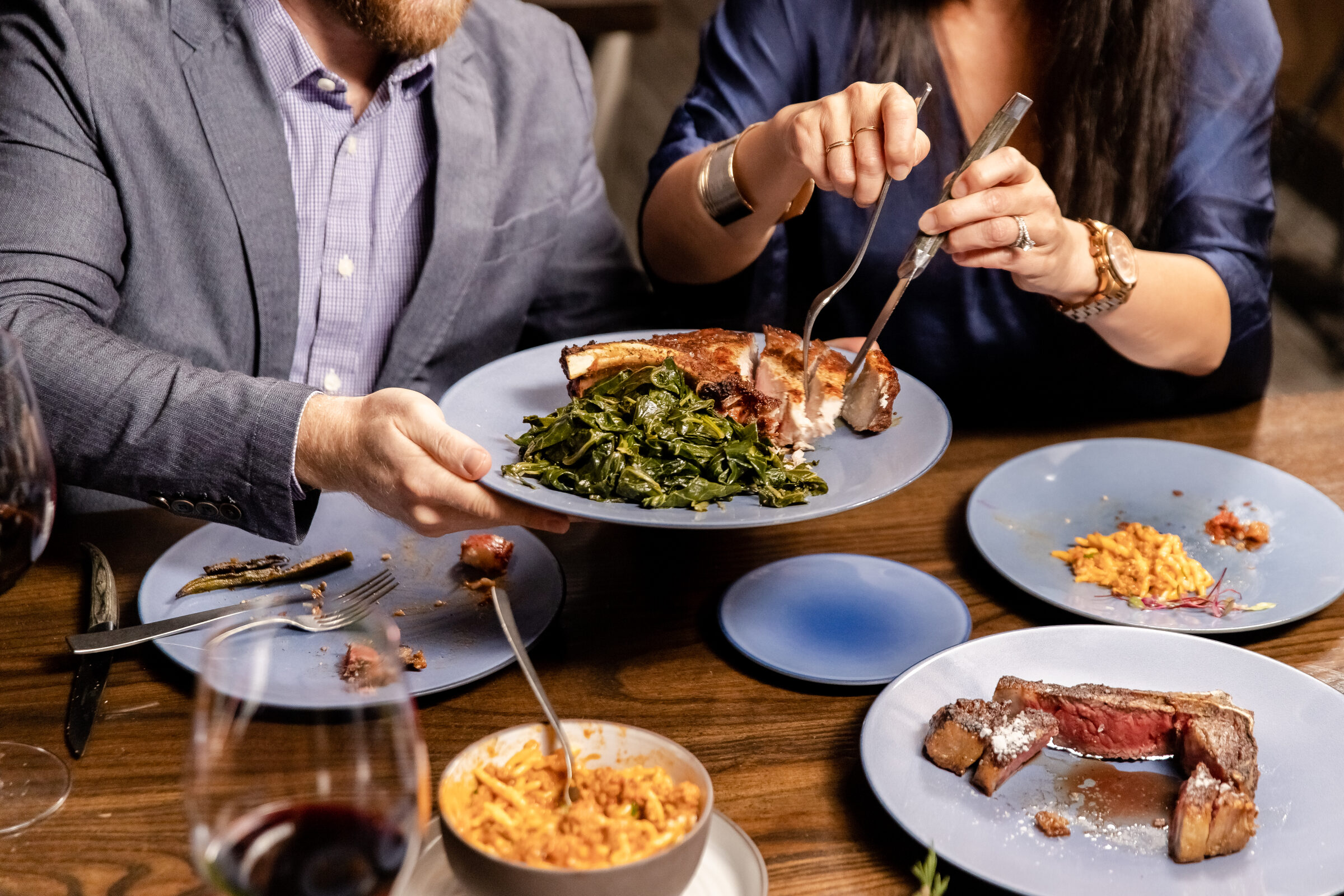 Guests sharing a celebration dinner at a set table