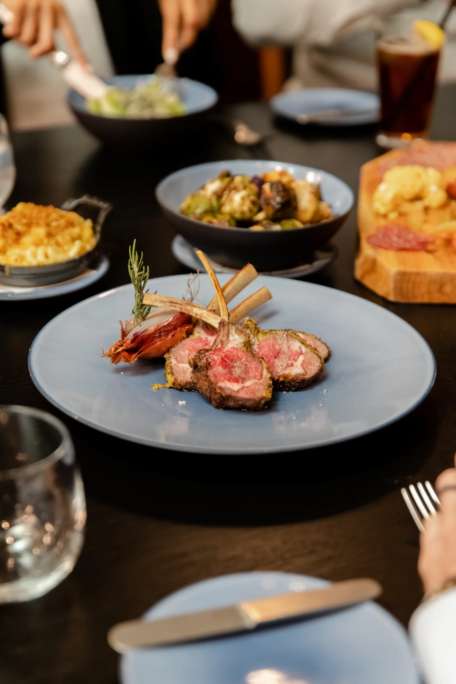 A plated lamb dish at Knife Steakhouse Plano