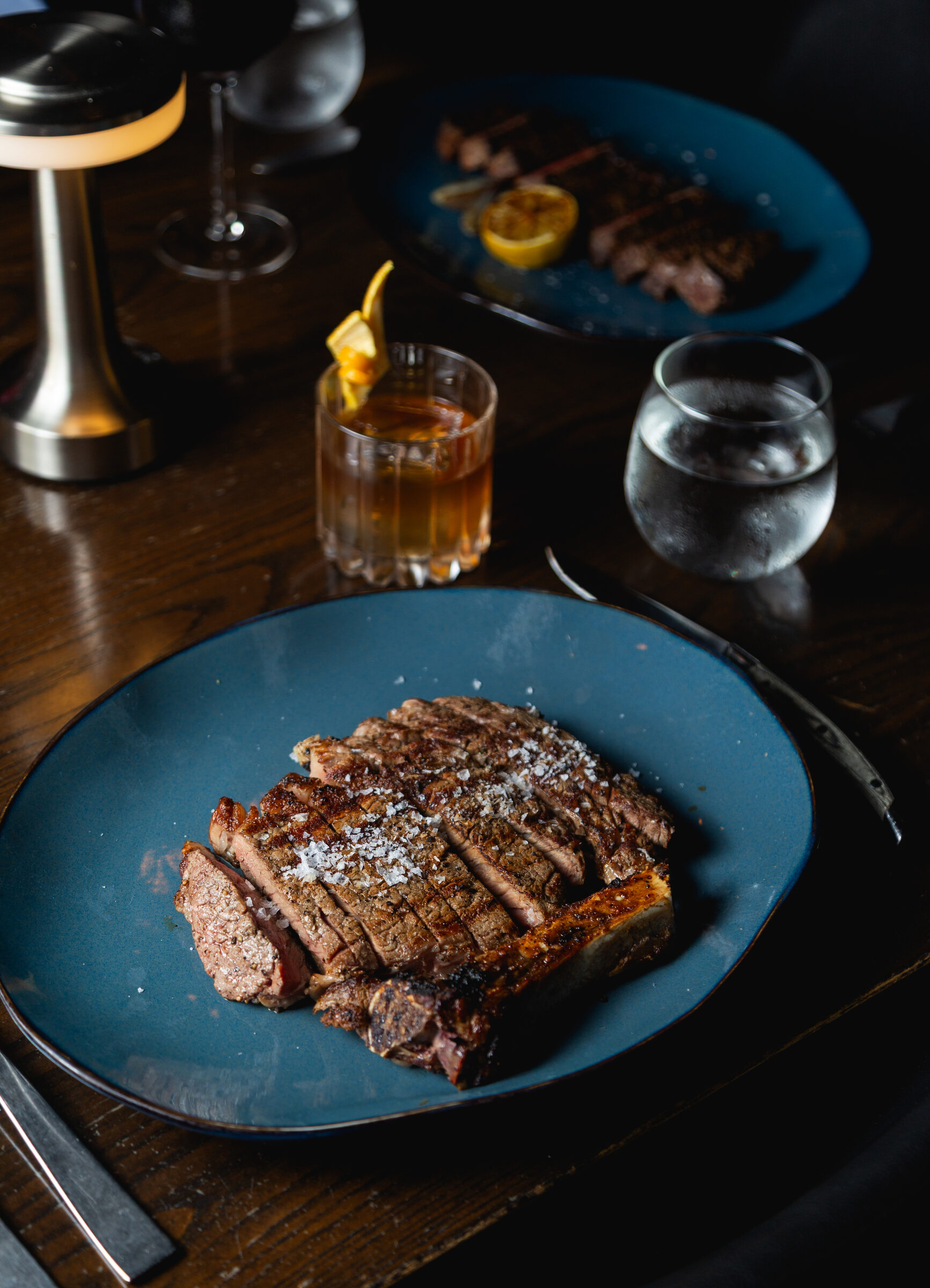 A sliced ribeye at the table