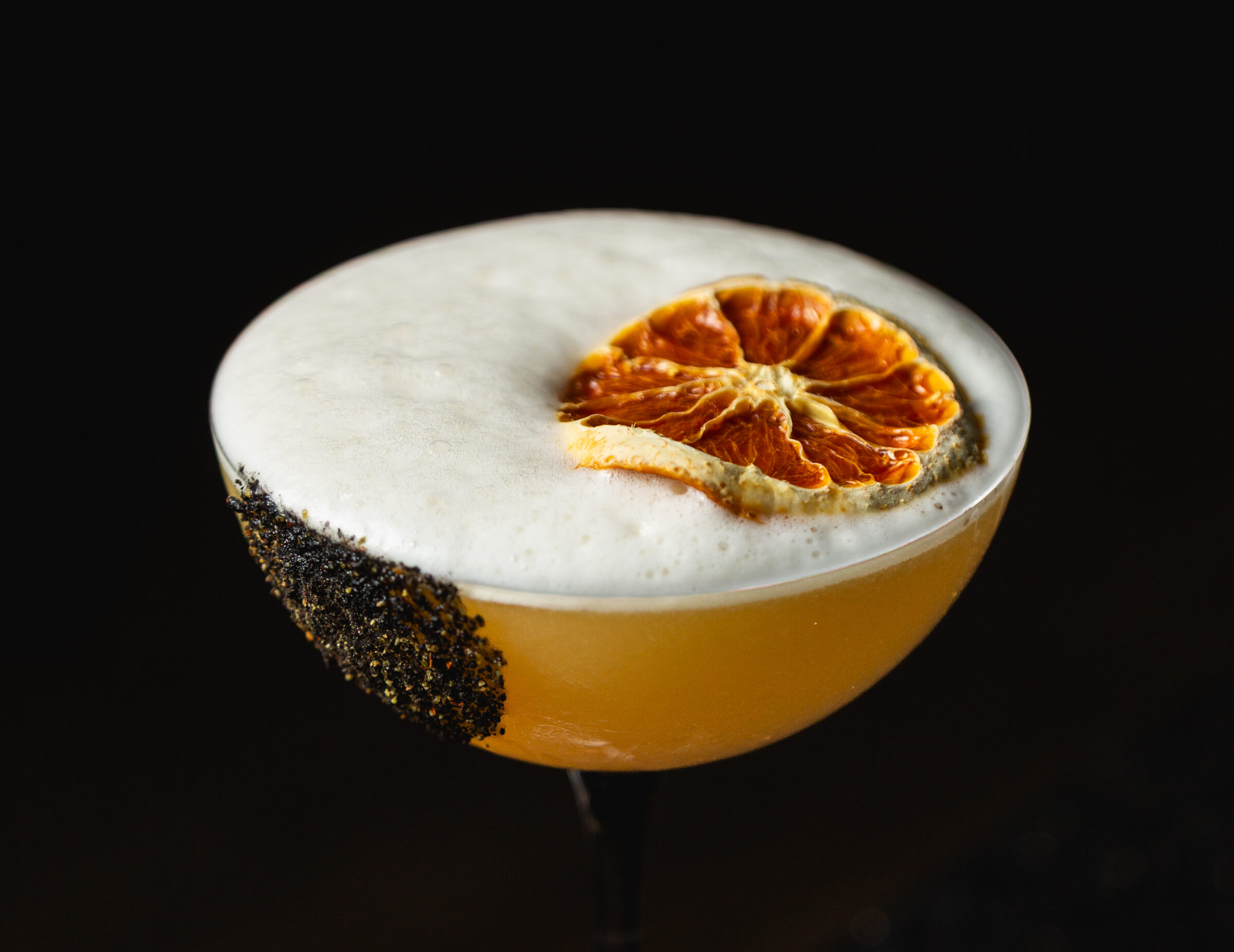 A cocktail, close up at the bar