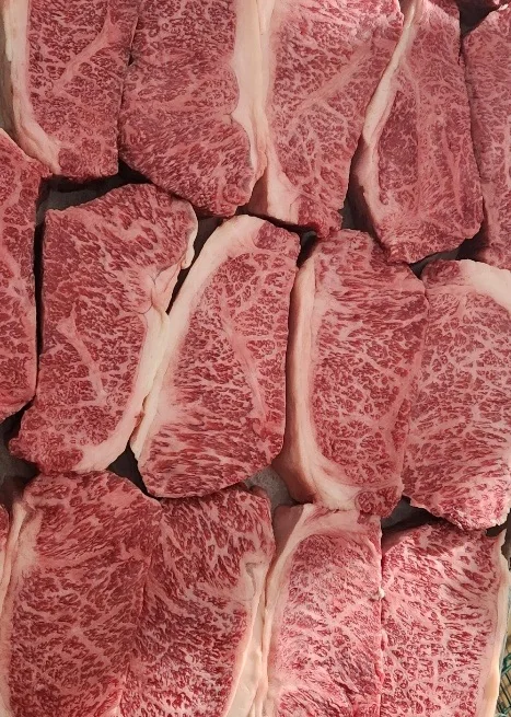 Wagyu steaks with heavy marbling at Knife Steakhouse Plano